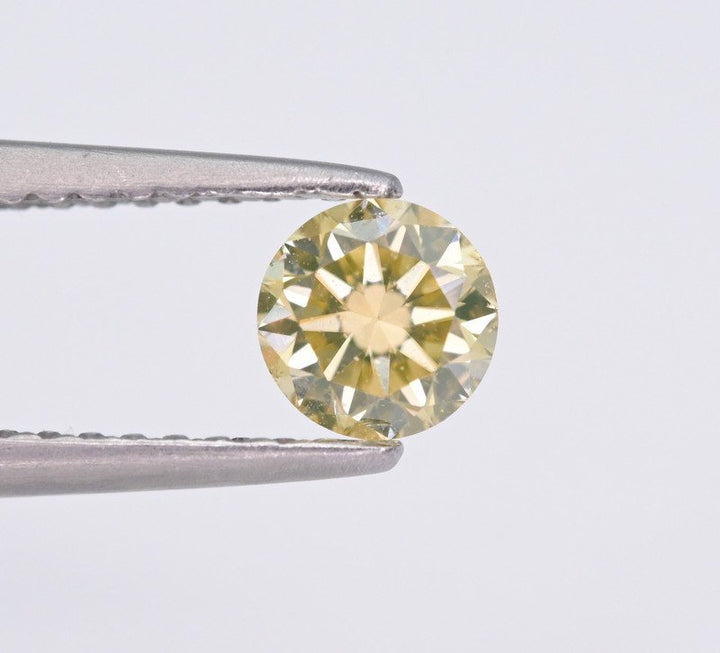 Beautiful Yellowish Faceted Fancy Diamond