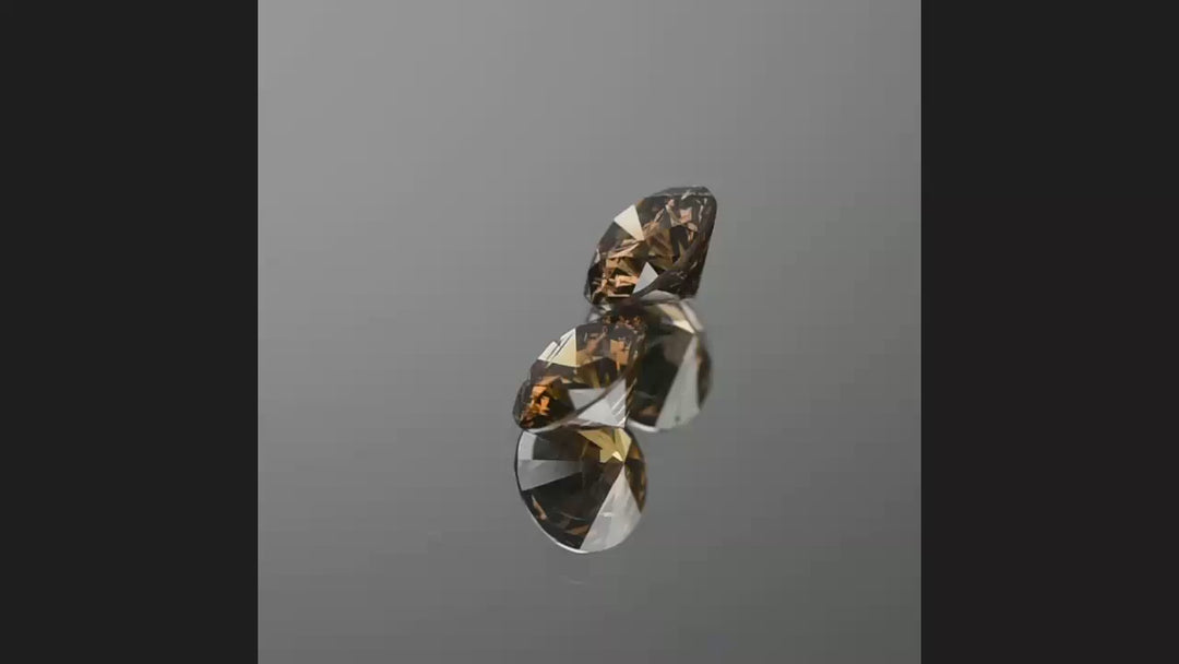 Round Pair Of Fancy Dark Orangy Brown Diamond